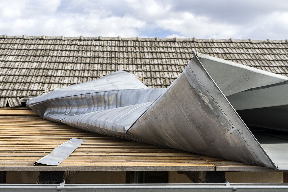 Metal roof top demolished by a strong wind