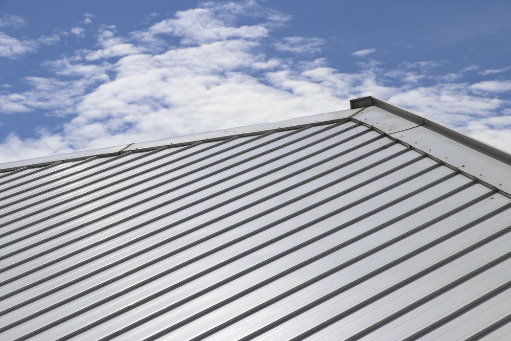 What is the Difference Between Standing Seam Metal Roofing and Corrugated Metal Roofing