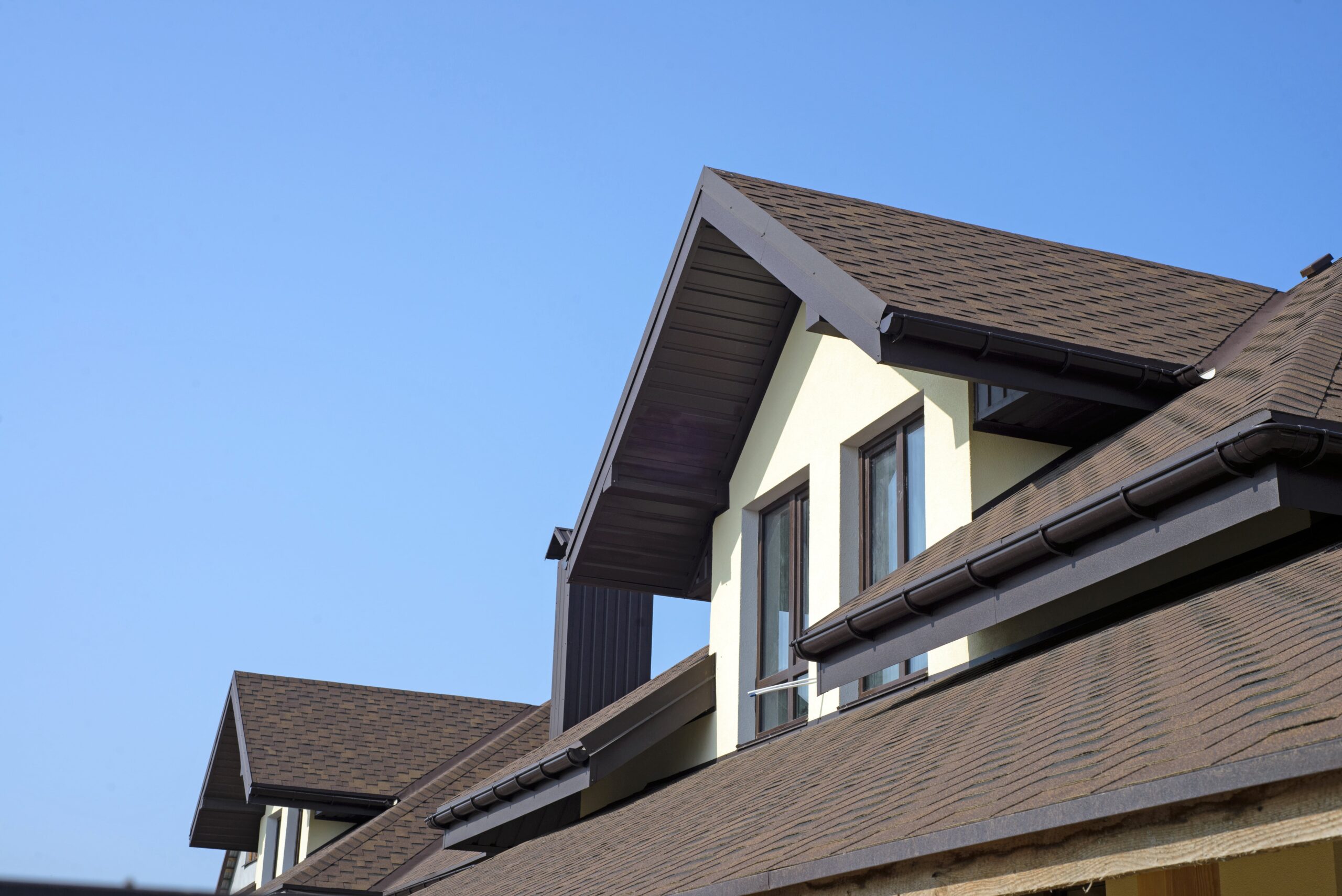 Shingle roofing on a house for small roof repair contractors to work