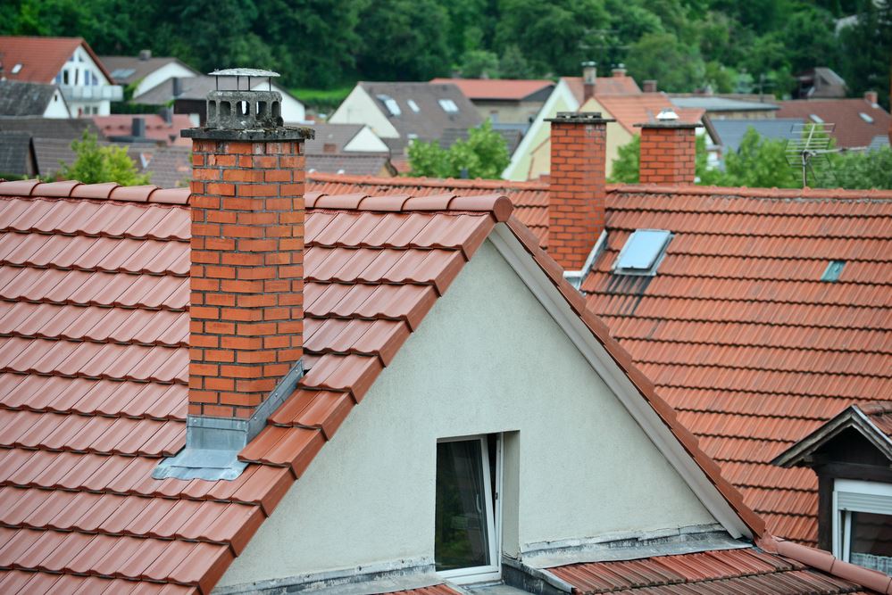 Tile roofing with chimney